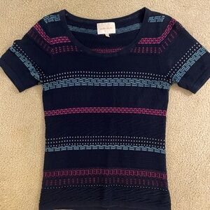 Stylish Navy Knit Top with Vibrant Stripes